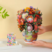Illawarra-Essence-Australian-native-paper-pop-up-bouquet-of-proteas-and-banksia-—-PetalPal