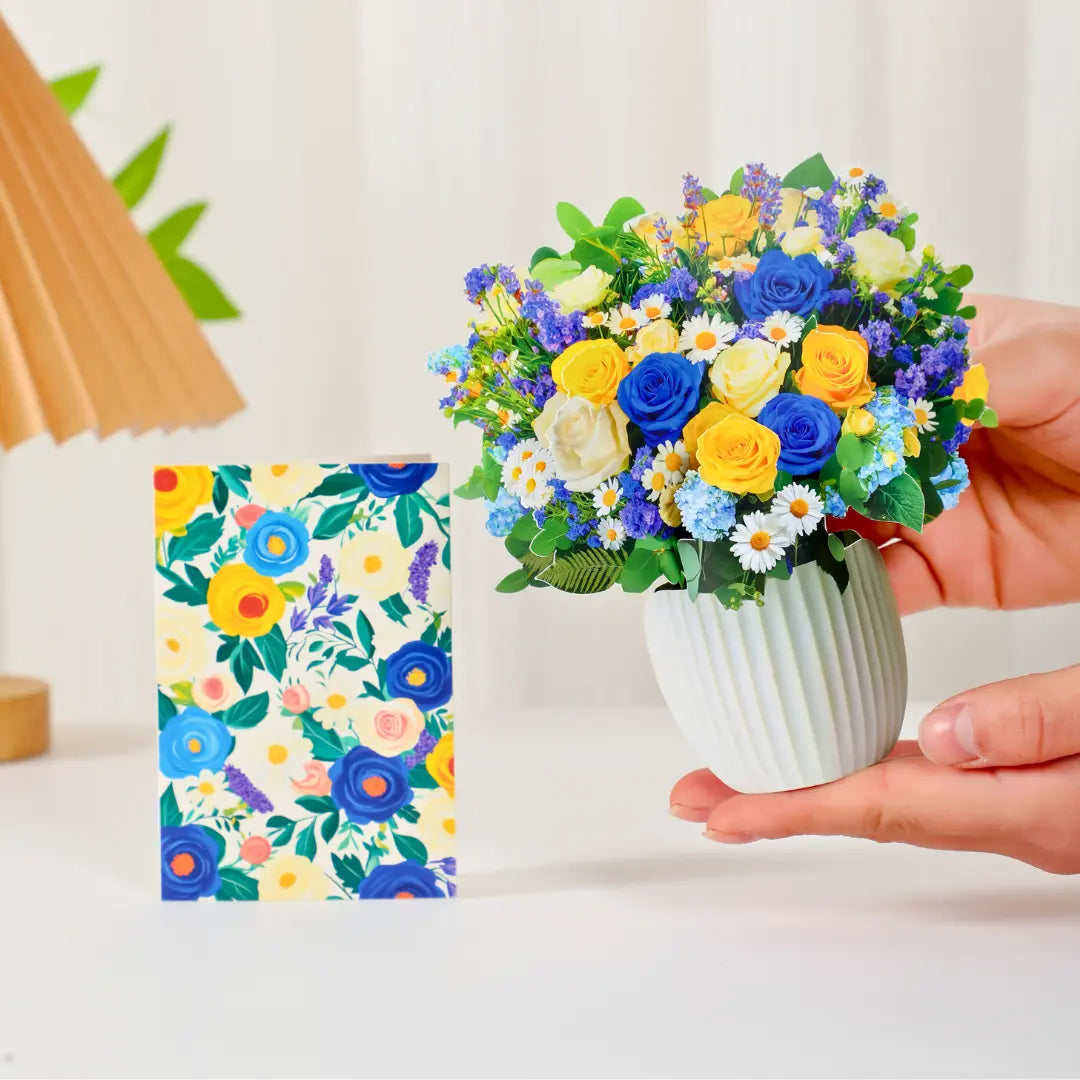Mini-Cerulean-Dream-small-paper-pop-up-bouquet-of-blue-and-gold-roses-—-PetalPal