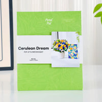 Mini-Cerulean-Dream-small-paper-pop-up-bouquet-of-blue-and-gold-roses-—-PetalPal