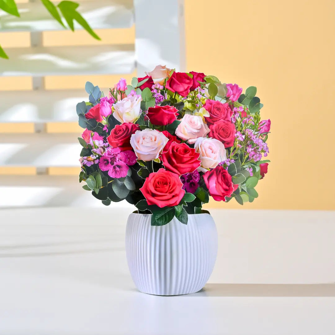 Mini-Rosy-Radiance-small-paper-pop-up-bouquet-of-red-and-pink-roses-—-PetalPal